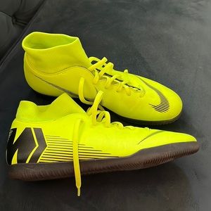 Mercurial indoor soccer shoes.